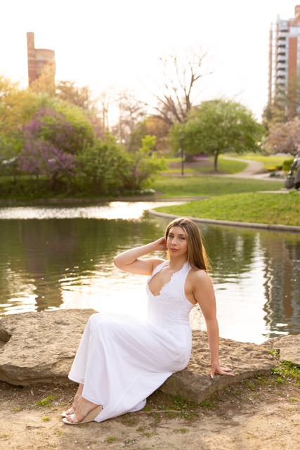 high school senior girl posing by the pond in Eden Park