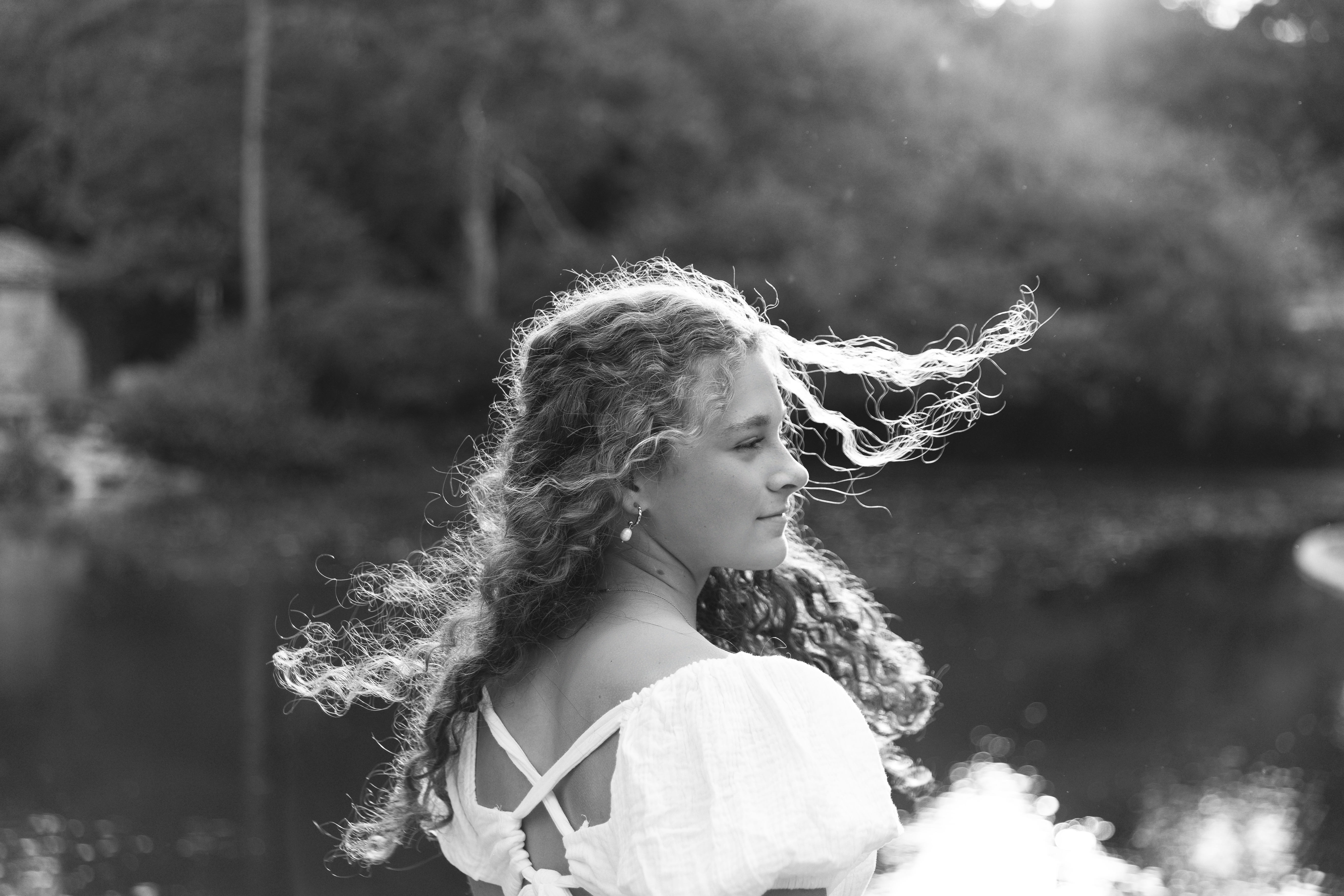 beautiful girl spinning her coily hair