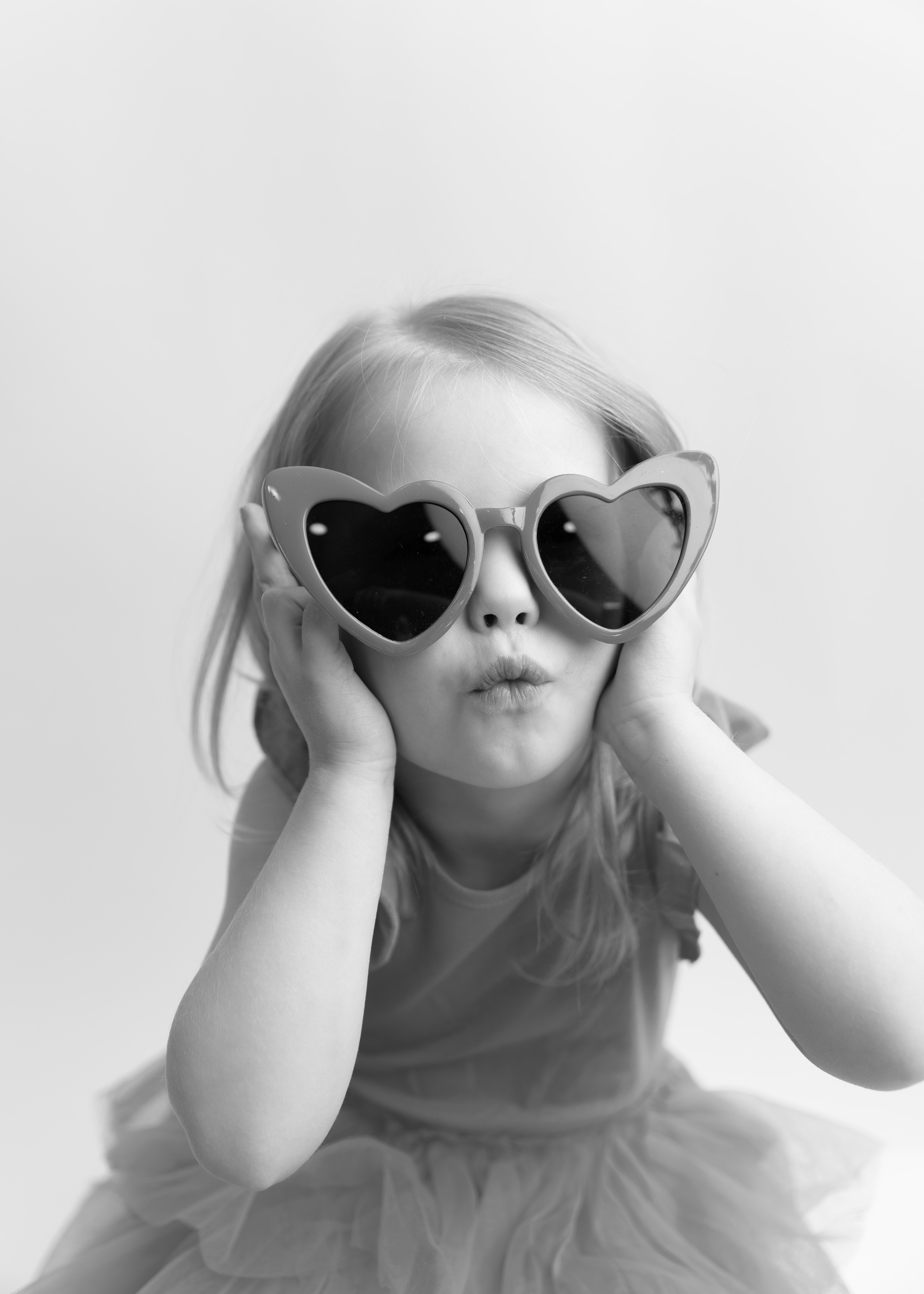 personality mini portrait little girl with heart shaped glasses