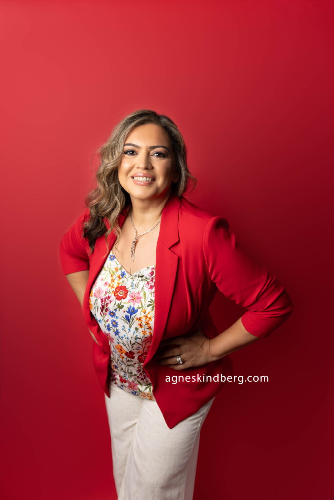 Women's headshots with red background