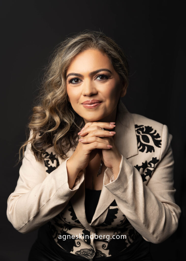 women's headshots in black background
