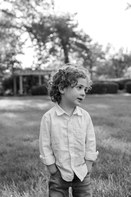 little boy posing at Ault Park during photoshoot at Ault Park